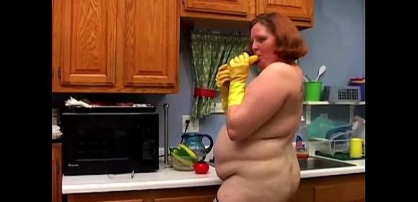  Hot and horny chubby housewife has a nice wank in the kitchen